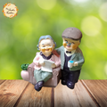 Elderly Couple Clay Figurine