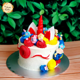 Chelsea Unicorn Artistic Cake with Red Drawn Eyes (Floral Marshmallow, Red, Blue, Yellow)