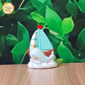 Blue Narwhal with Sailboat Ceramic Figurine
