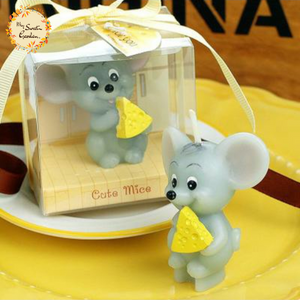 Mouse eating a Cheese Themed Candle